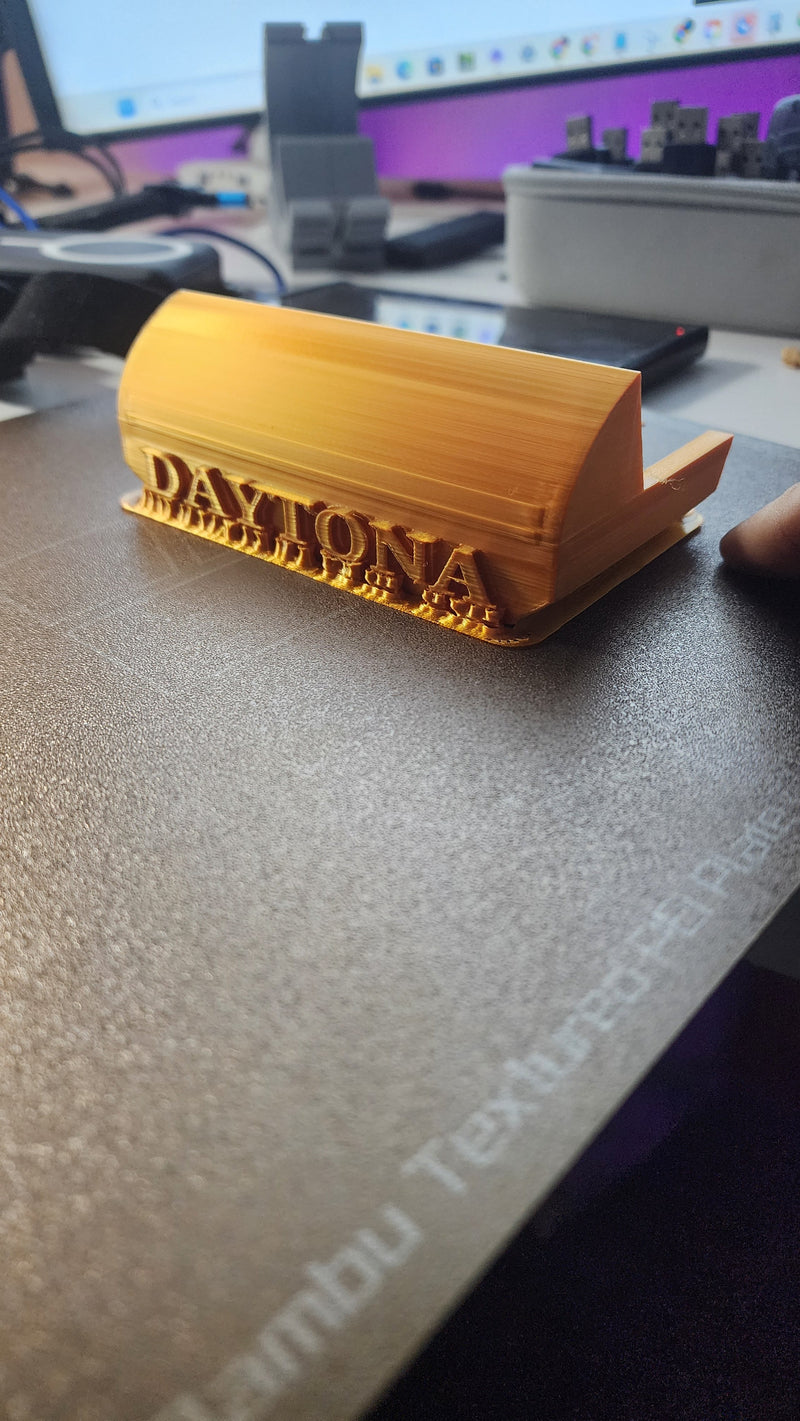 A gold display glare cover made of PLA