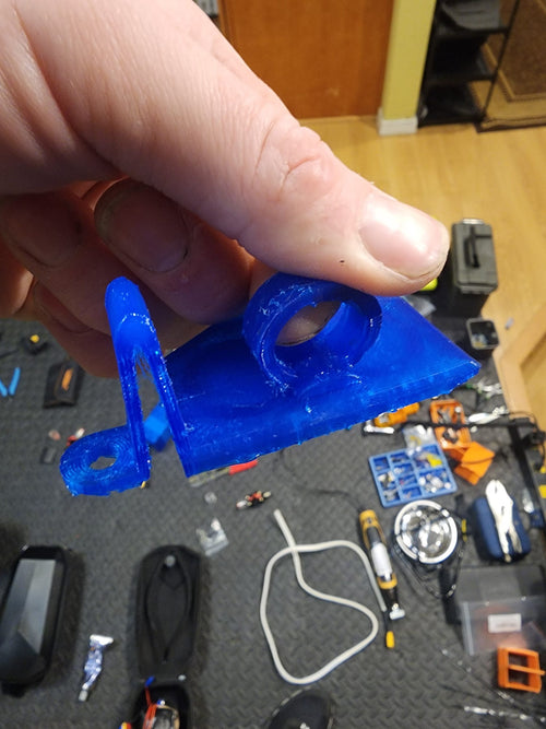 Charge port cover with finger loop for Sherman L image 1