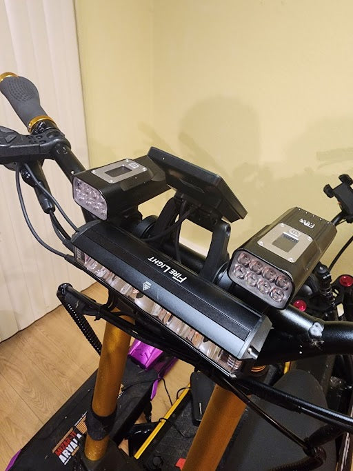 Electric scooter or e-bike bundle mounted to the Wolf GT Pro.